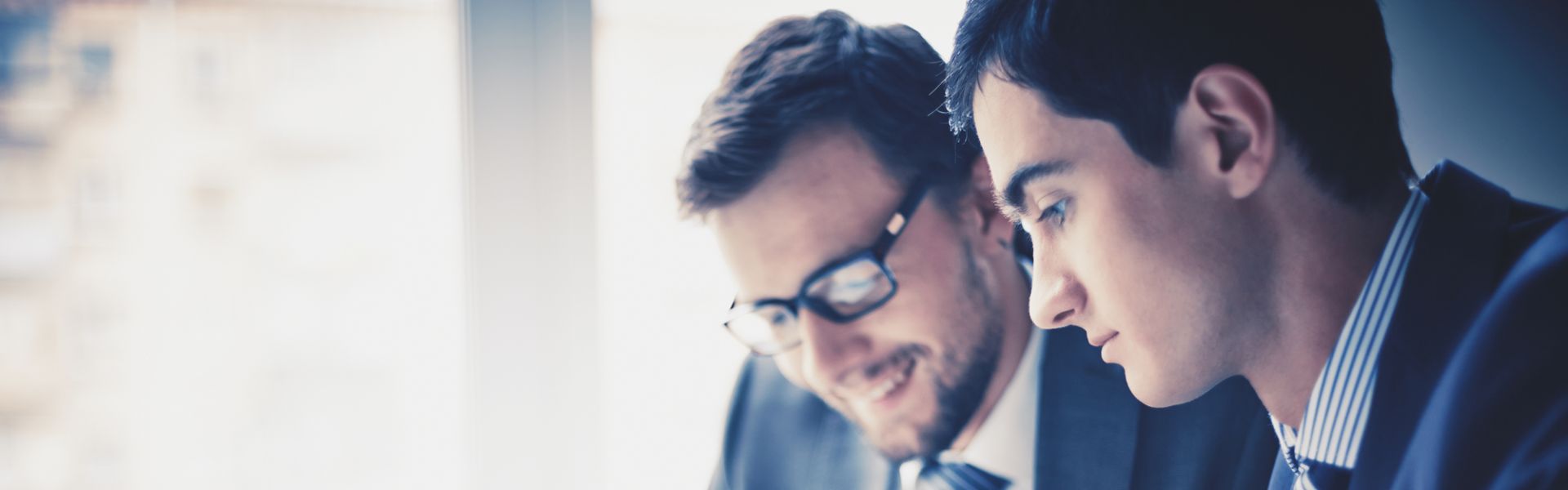 NHS SBS Finance & Accounting services; two male accountants