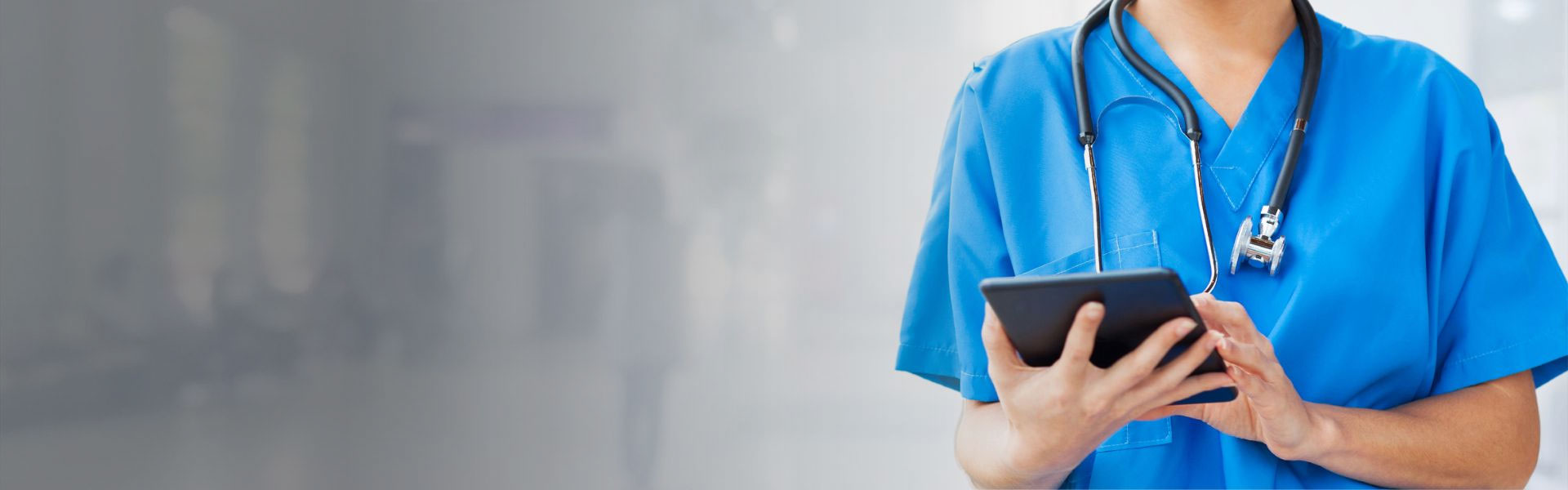 NHS SBS Our Services: female nurse on a digital device